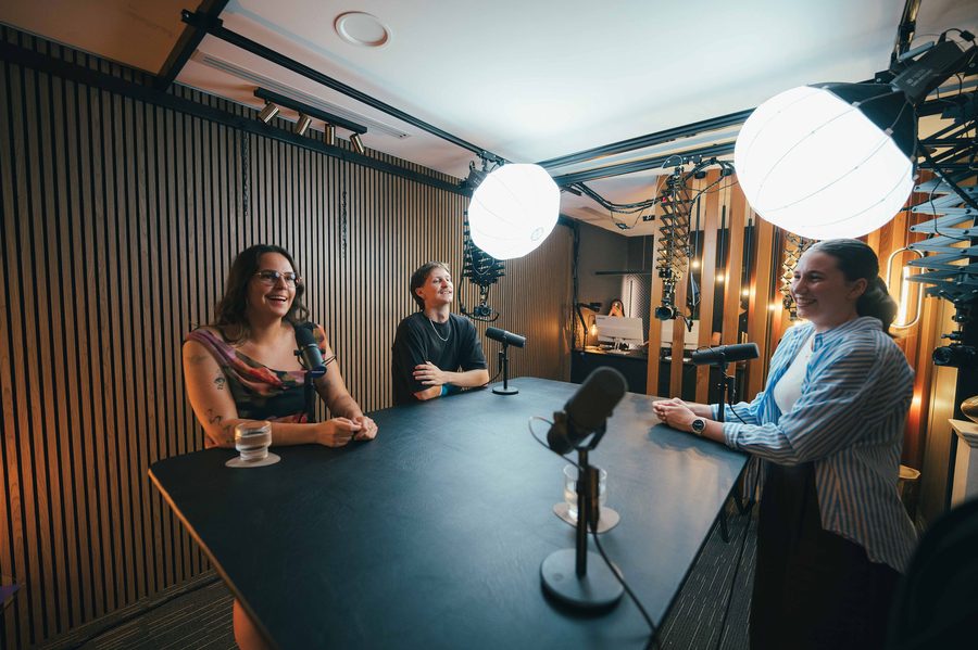 Students learning to podcast